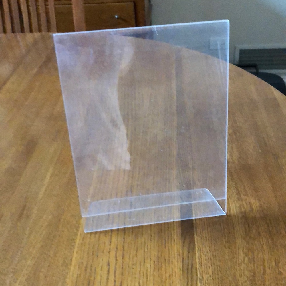 Six - Plastic clear frames. 8 x 11 Six frames. Some scratches.